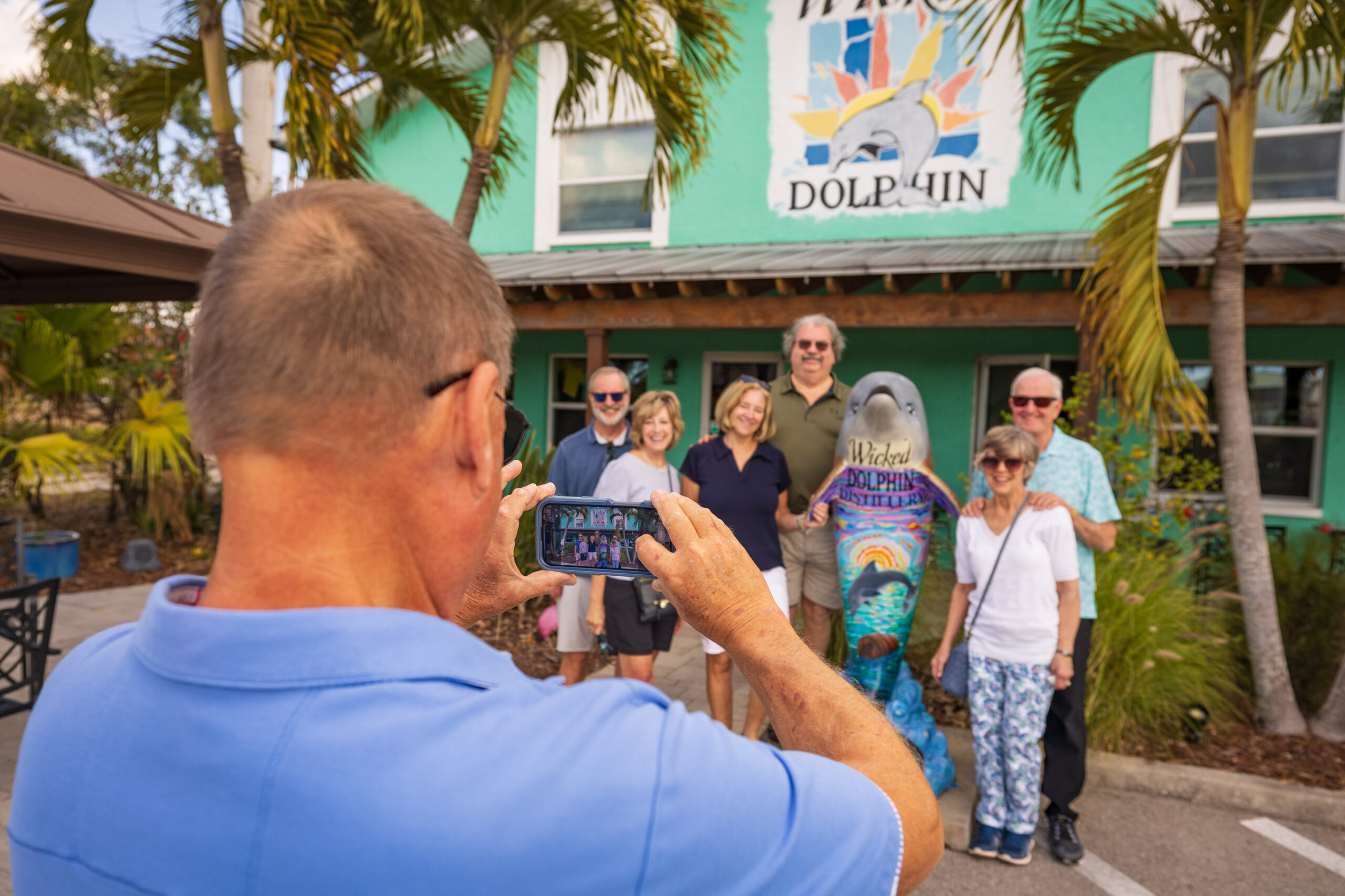 Visitors enjoying a tour at Wicked Dolphin Distillery